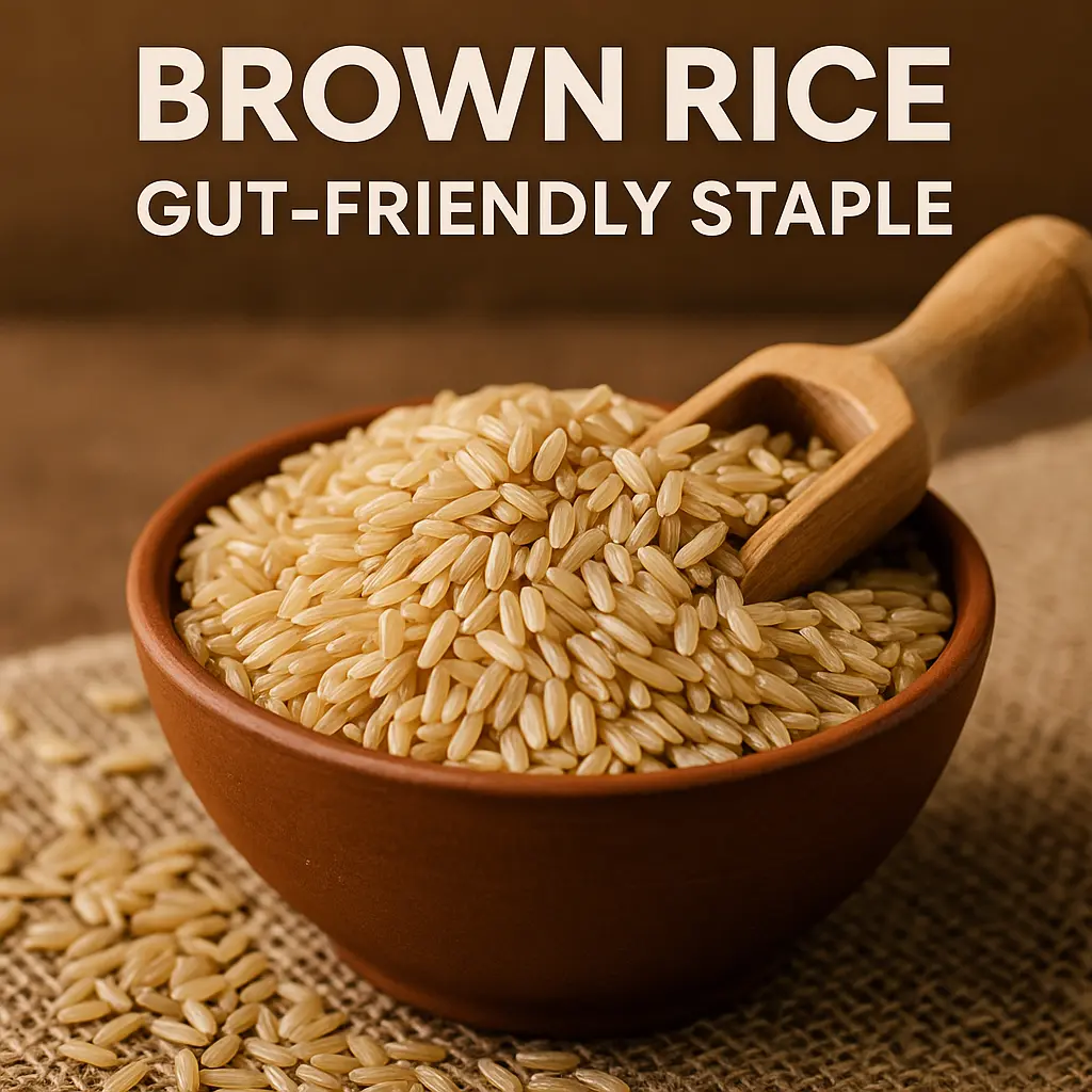 Brown rice in terracotta bowl with scoop showing gut-friendly benefits