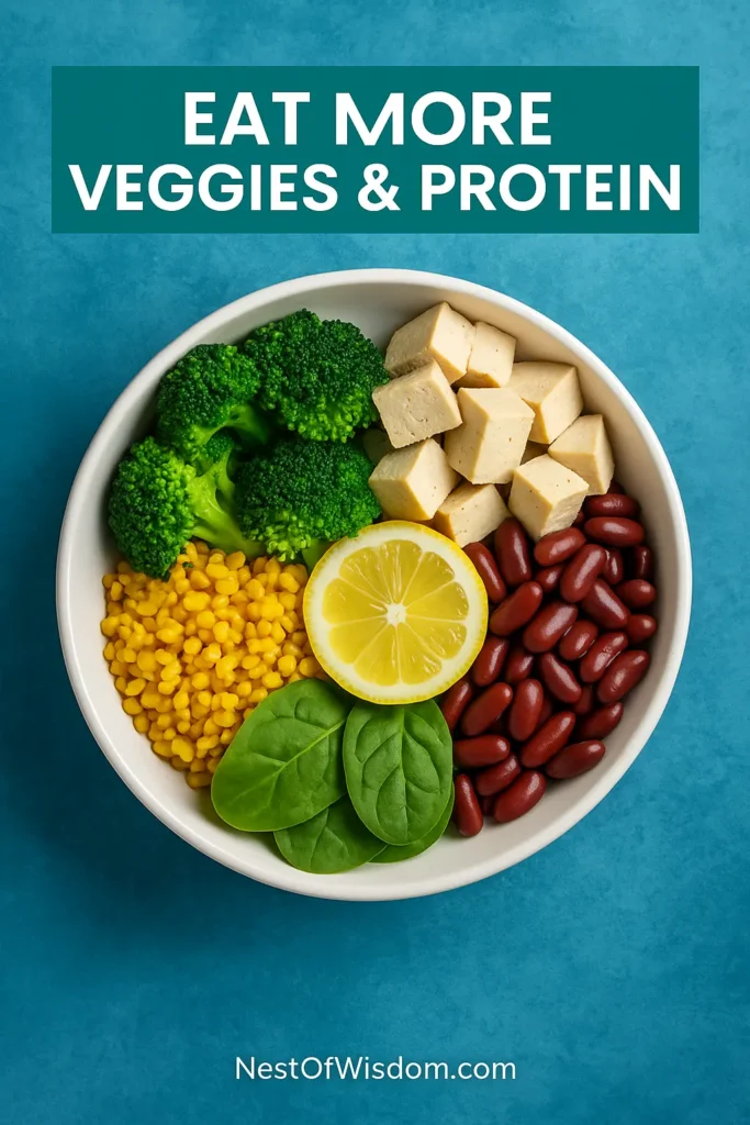 Colorful bowl with tofu, spinach, broccoli, mung dal, and kidney beans on a blue background